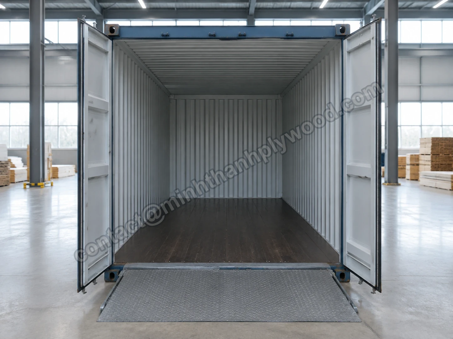Empty, clean 40HC shipping container with open doors and a loading plate at the dock