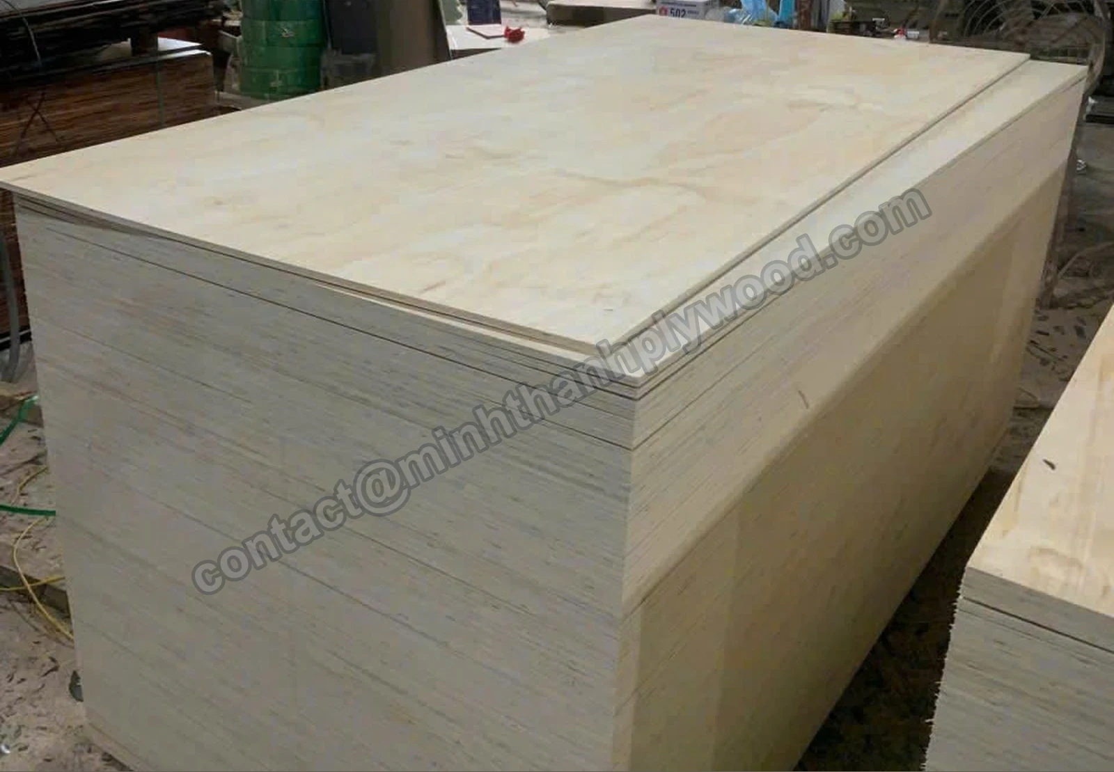 Pine-faced plywood panel on top of a finished pack, layered edges visible